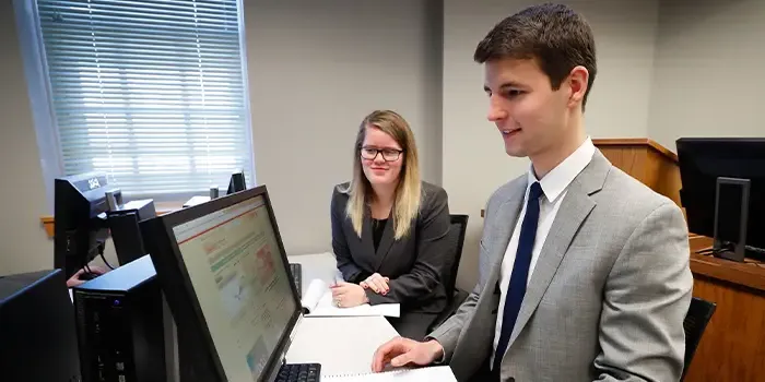 Business students at computer